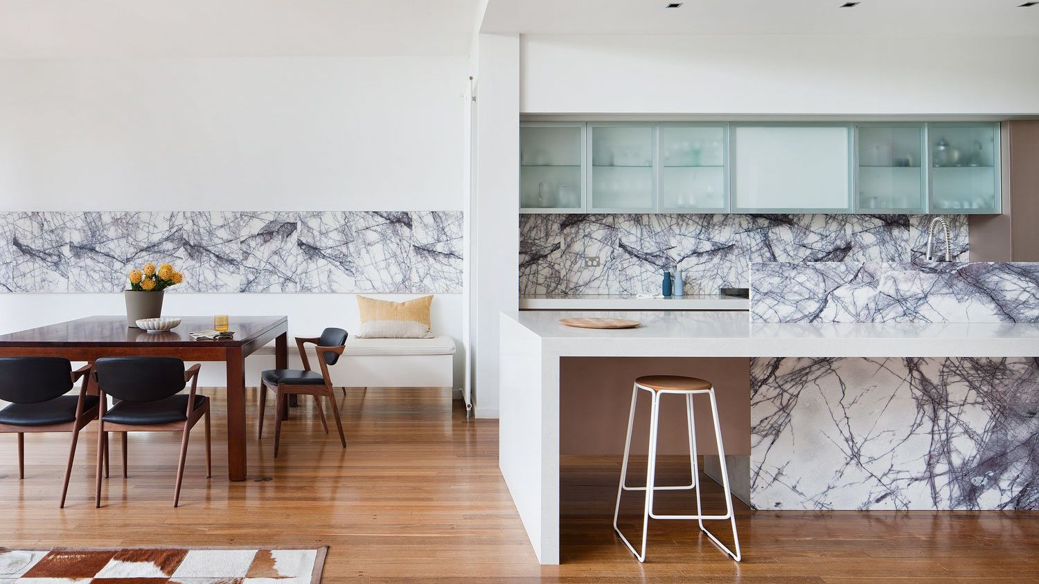 A kitchen with a New York Premium Marble benchtop.